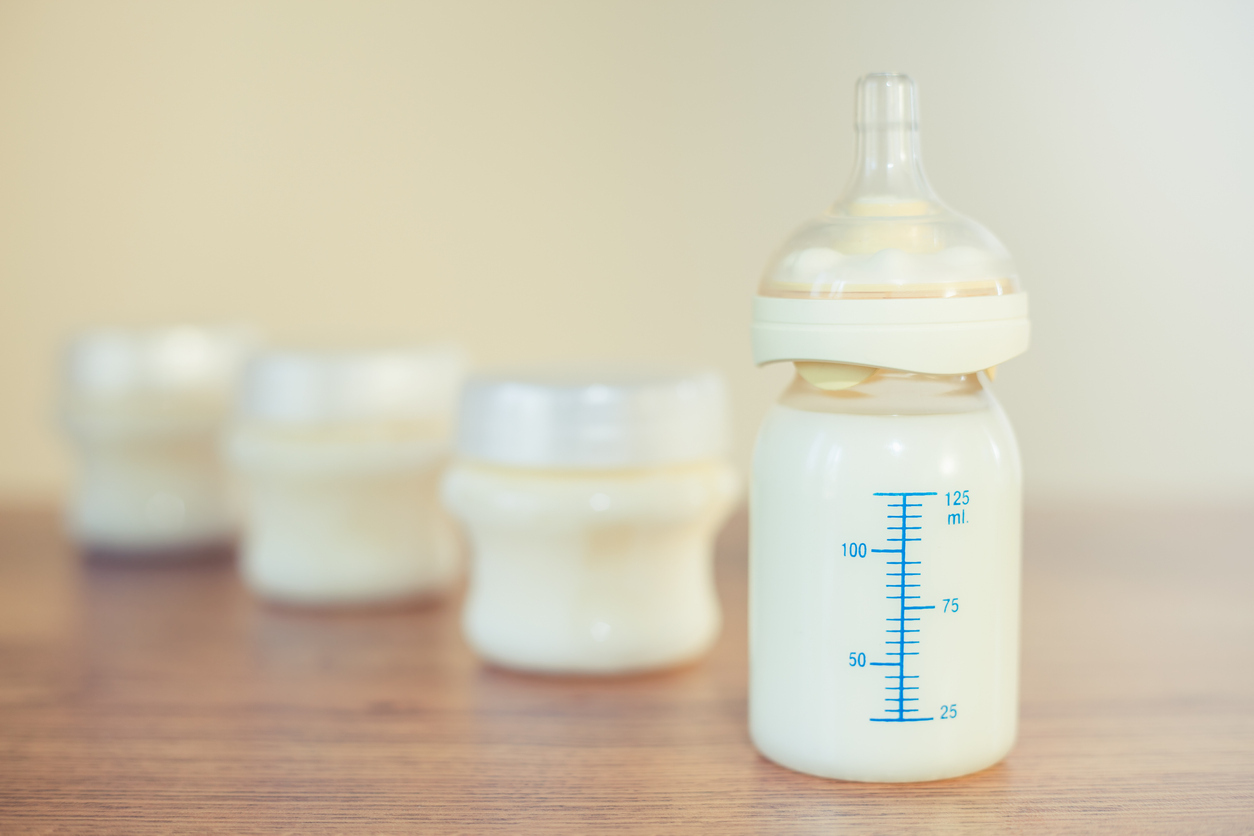 image of breast milk in bottles on counter showing breast milk color