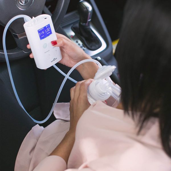 Spectra 9Plus Breast Pump in Use in car